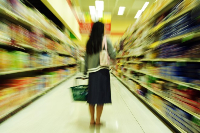 a woman shopping in a grocery store